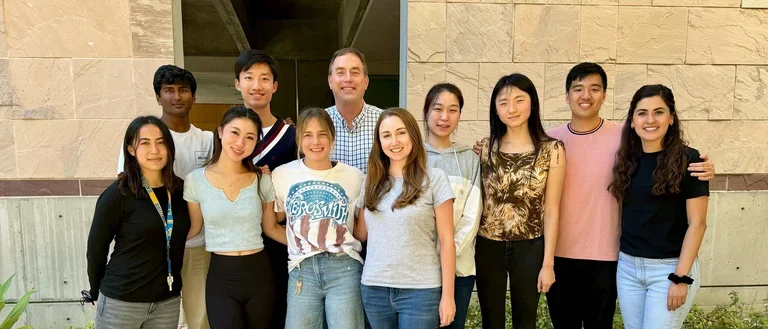 Outdoor group photo outside Molecular Science Building. Taken Fall 2023.