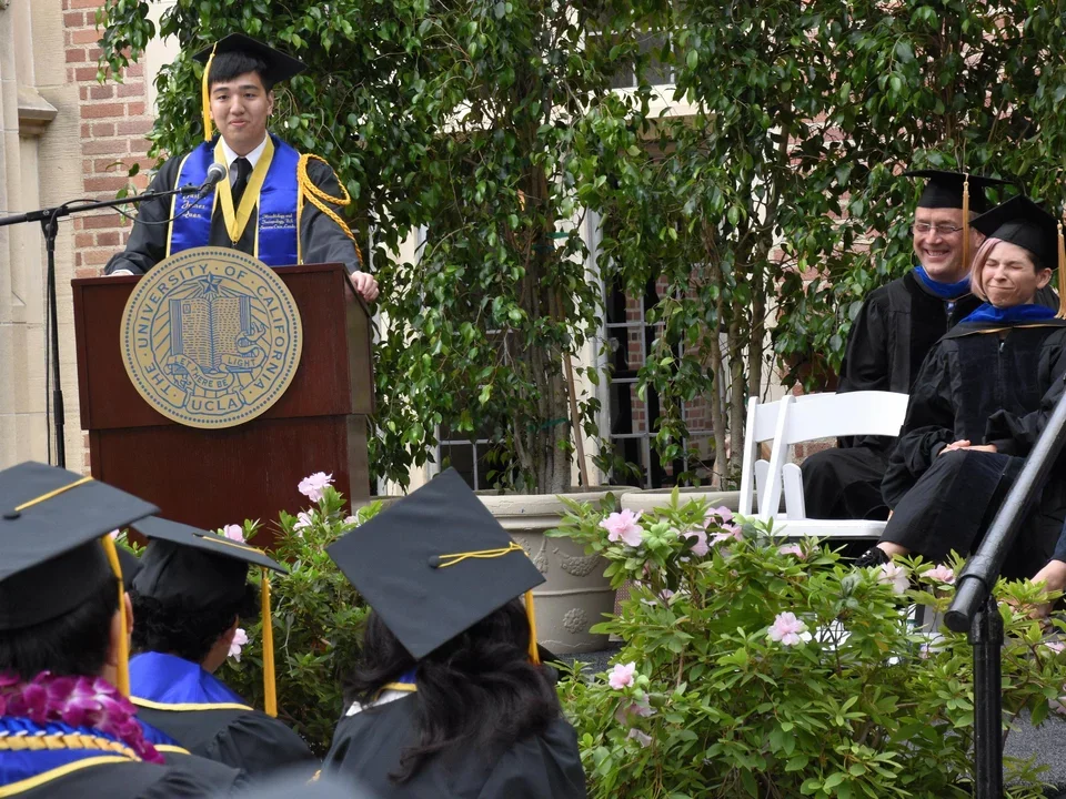 Student on podium giving a speech