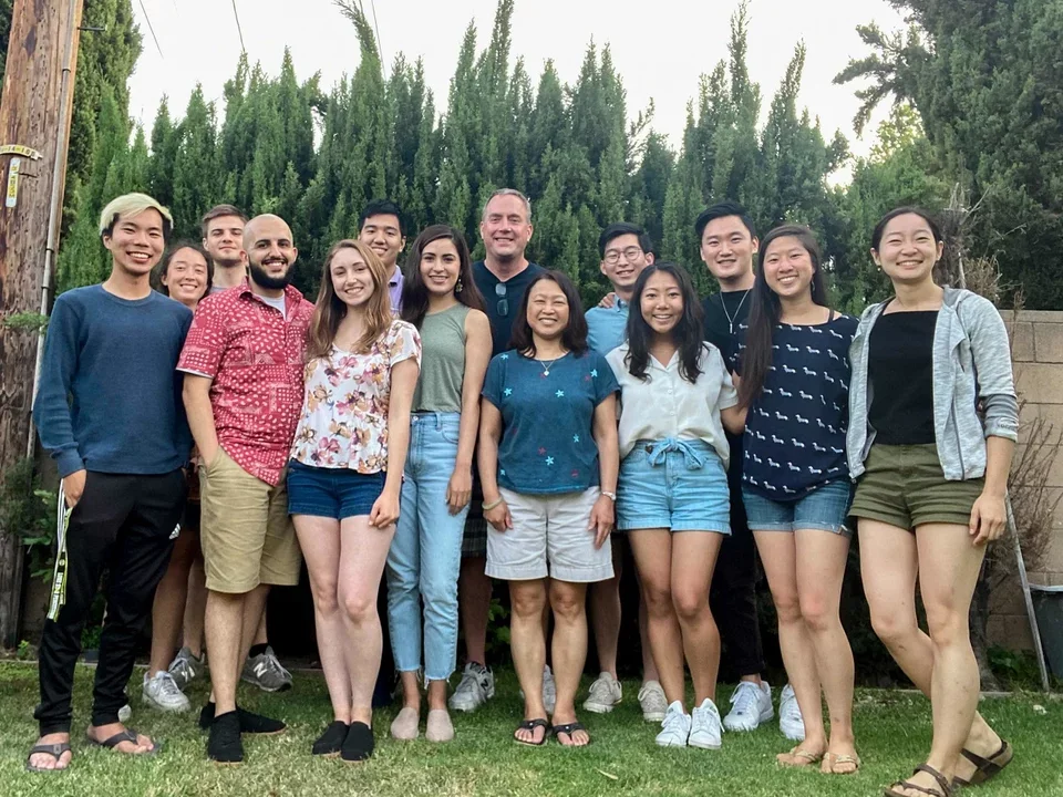 Outdoor group photo in Peter’s backyard. Taken Spring 2021.