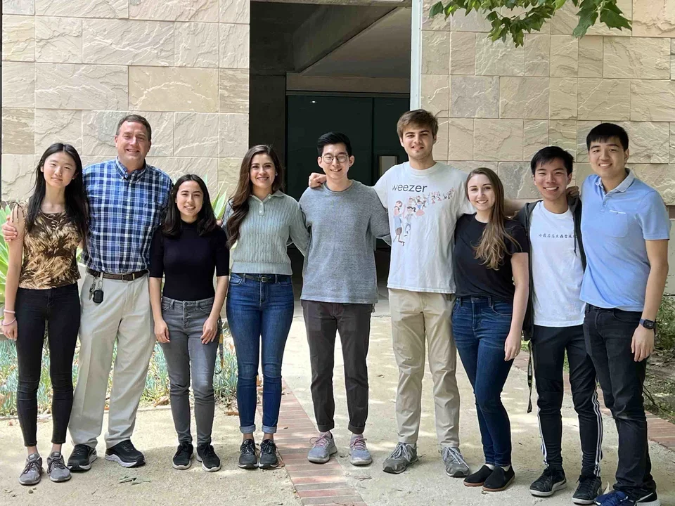 Outdoor group photo outside Molecular Science Building. Taken Spring 2022.
