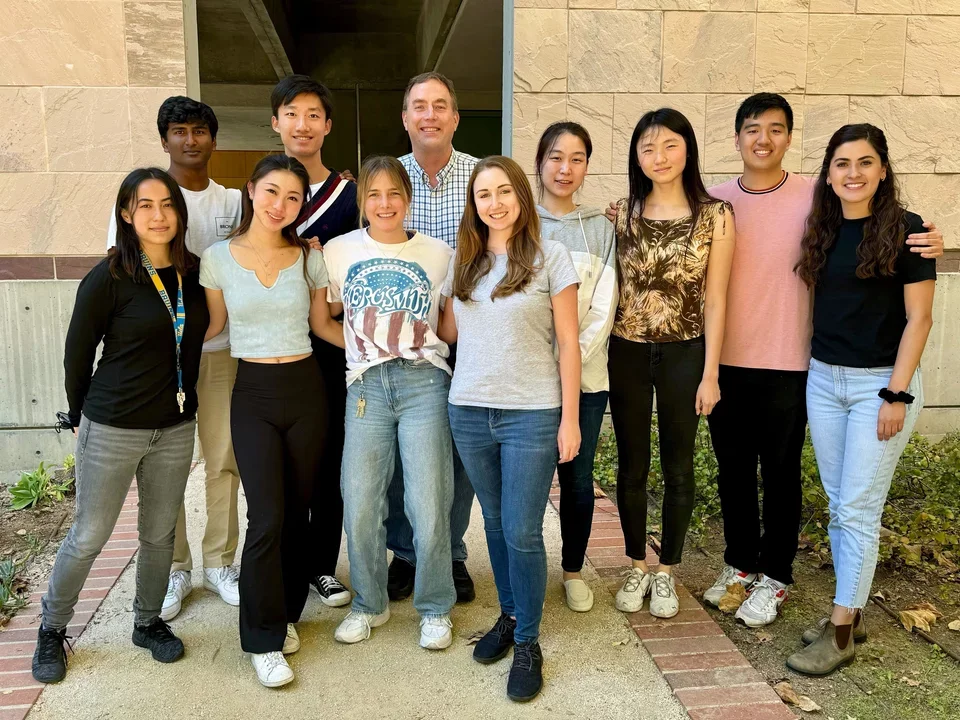 Outdoor group photo outside Molecular Science Building. Taken Fall 2023.