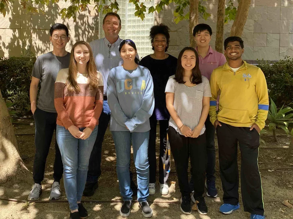 Outdoor group photo outside Molecular Science Building. Taken Summer 2022.