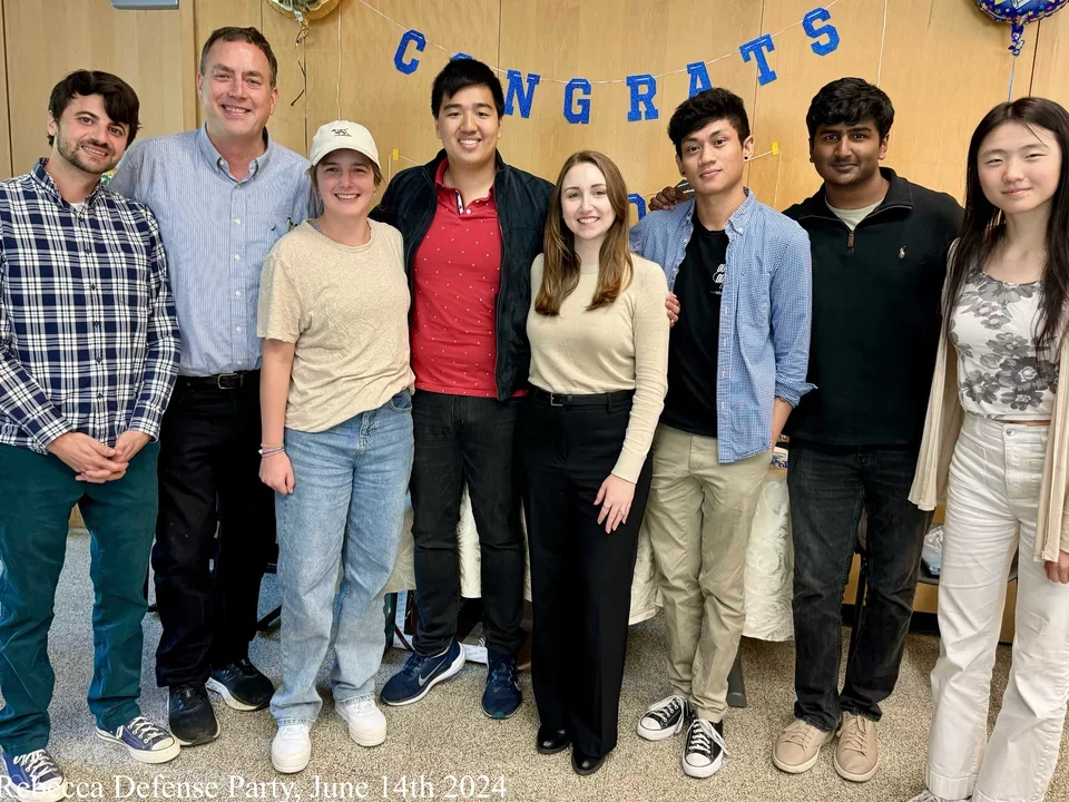 Bradley Lab posing for a group photo at Rebecca's defense
