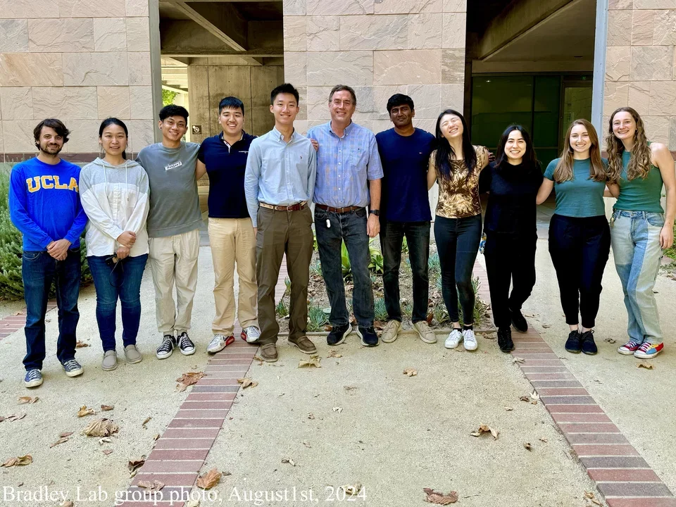 Bradley Lab posing for group photo outside MSB