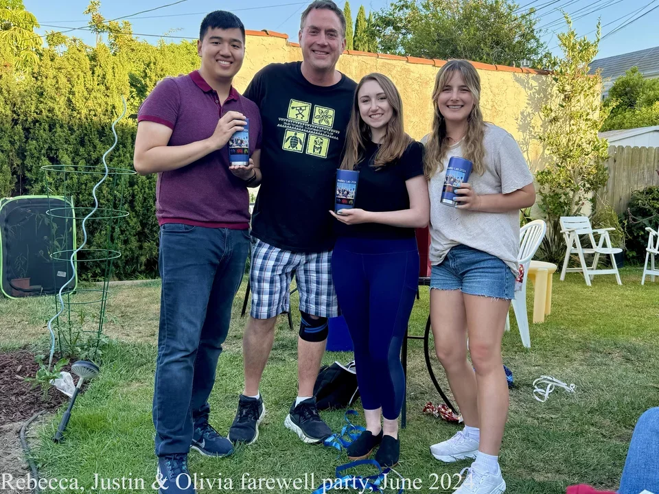 3 students holding water bottles