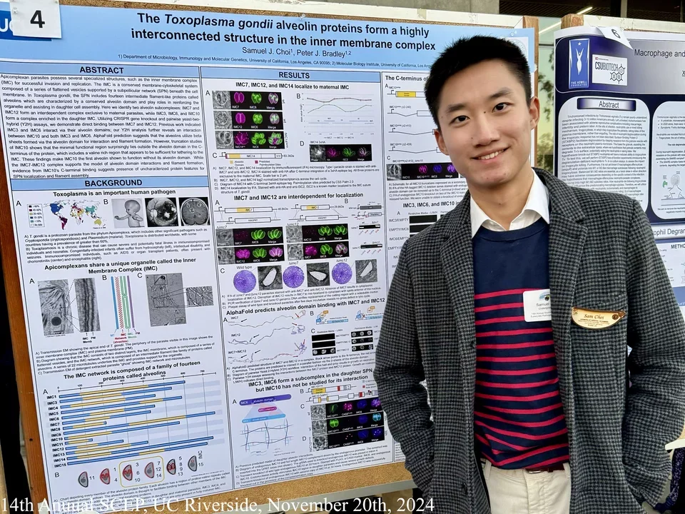 Sam presenting a poster