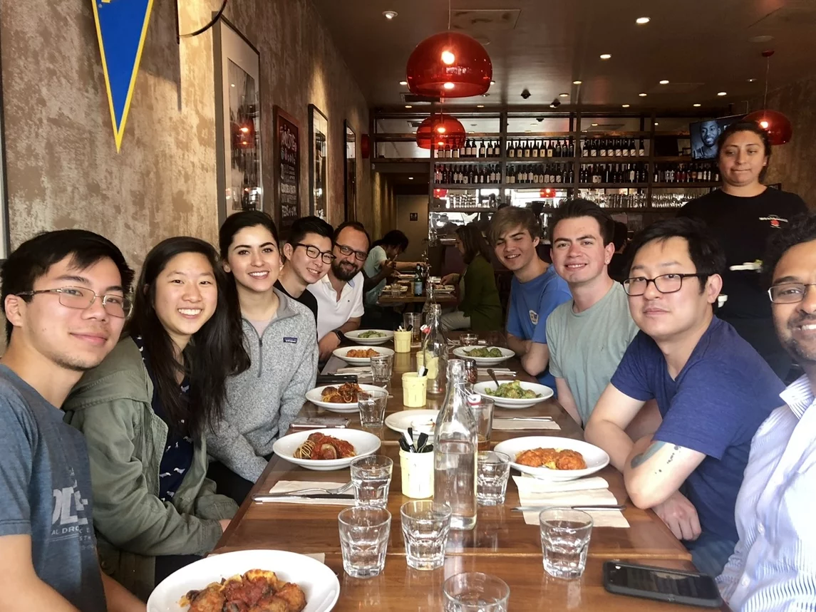 The entire lab are posing for a photo during a lunch social at the restaurant House of Meatballs located in Westwood Village.