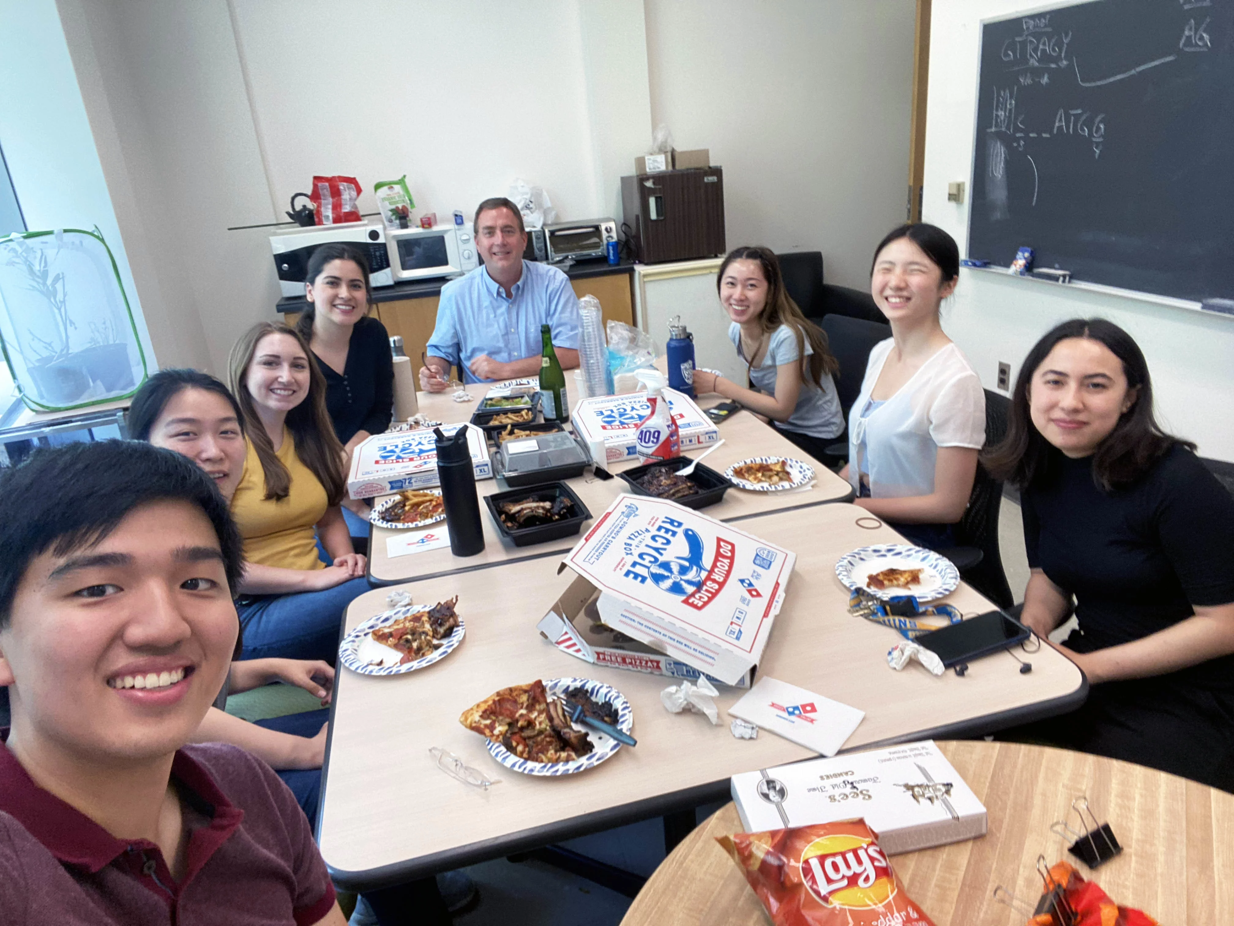 The entire lab celebrates our PI’s birthday with a pizza party.