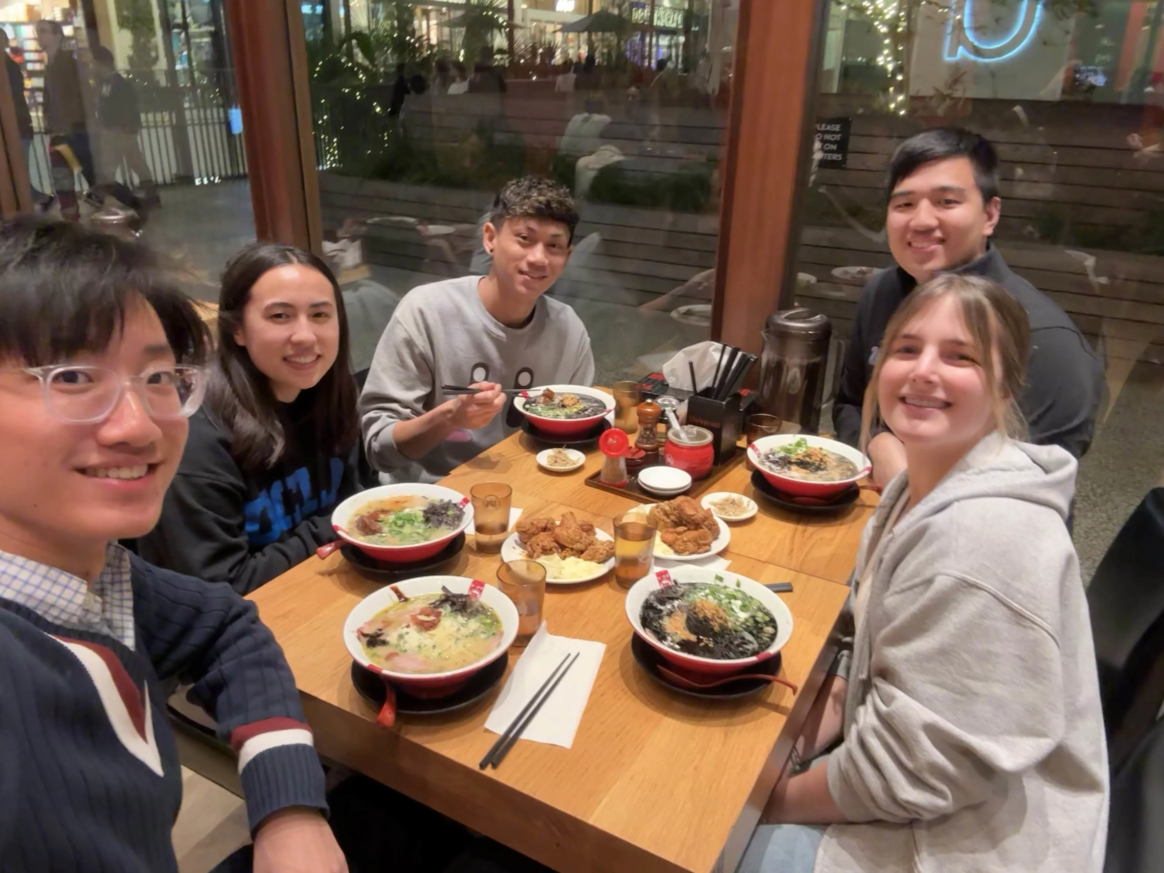 5 students eating ramen